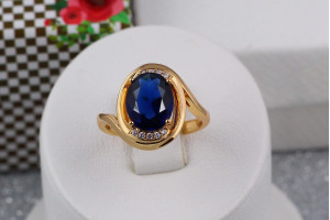 Кільце Xuping Jewelry вигнуті боки з синім овальним камнем р 16 золотисте