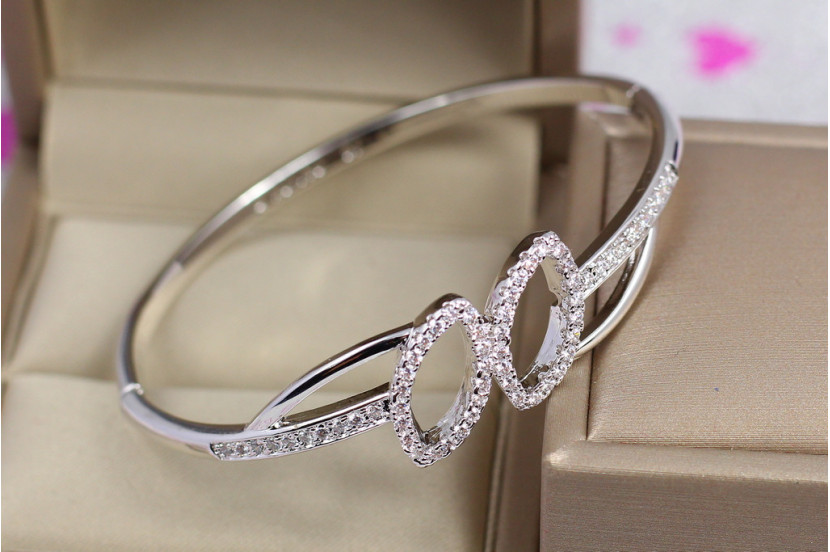 Браслет бэнгл Xuping Jewelry дві миндалинки 57 мм15 мм на руку від 16 см до 18 см сріблястий