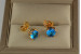 Сережки гвоздики Xuping Jewelry з блакитним каменем чотири кріплення 7 мм золотисті
