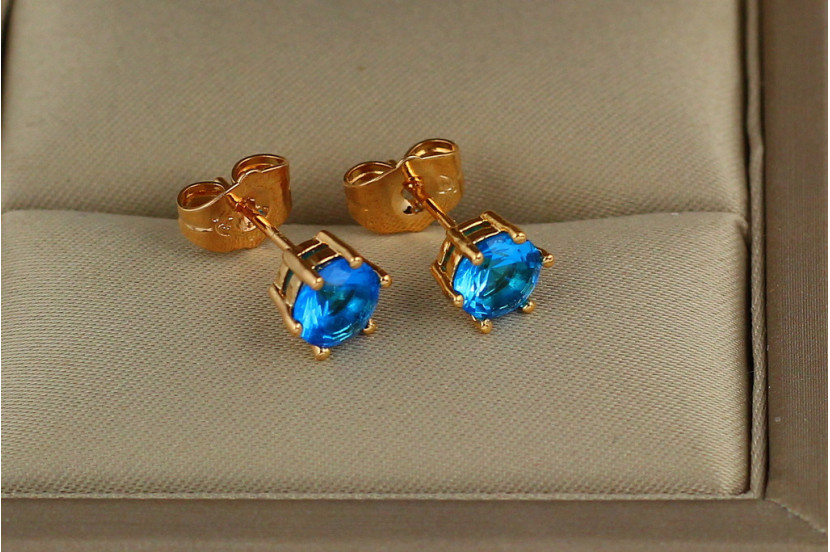 Сережки гвоздики Xuping Jewelry з блакитним каменем шість кріплень 6 мм золотисті