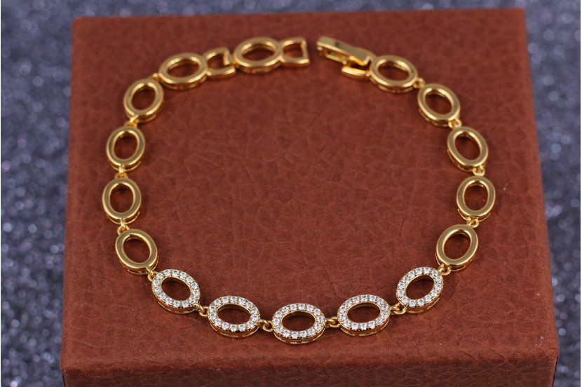 Браслет Xuping Jewelry п'ять фианитовых овалів 19 см 7 мм золотистий