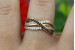 Кільце Xuping Jewelry нескінченність з білими і чорними каменями р 17 золотисте