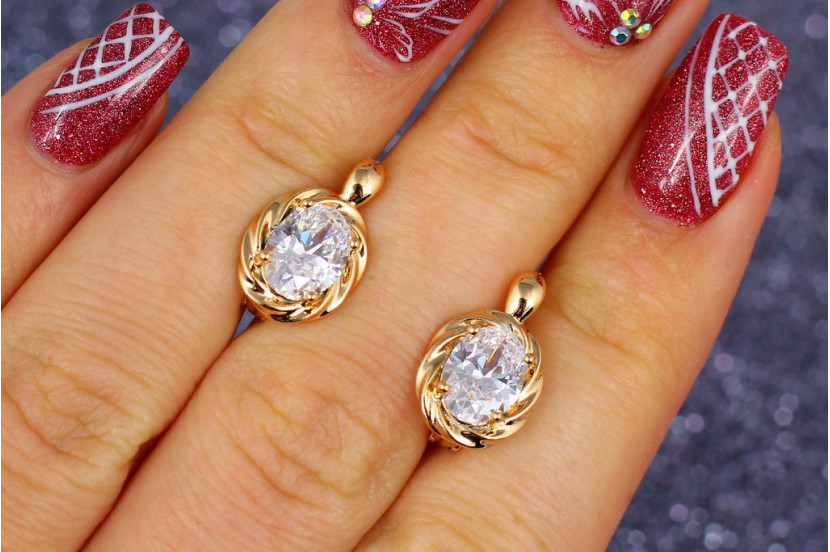 Сережки Xuping Jewelry овальні камені із завитками навколо каменю 1,5 см золотисті