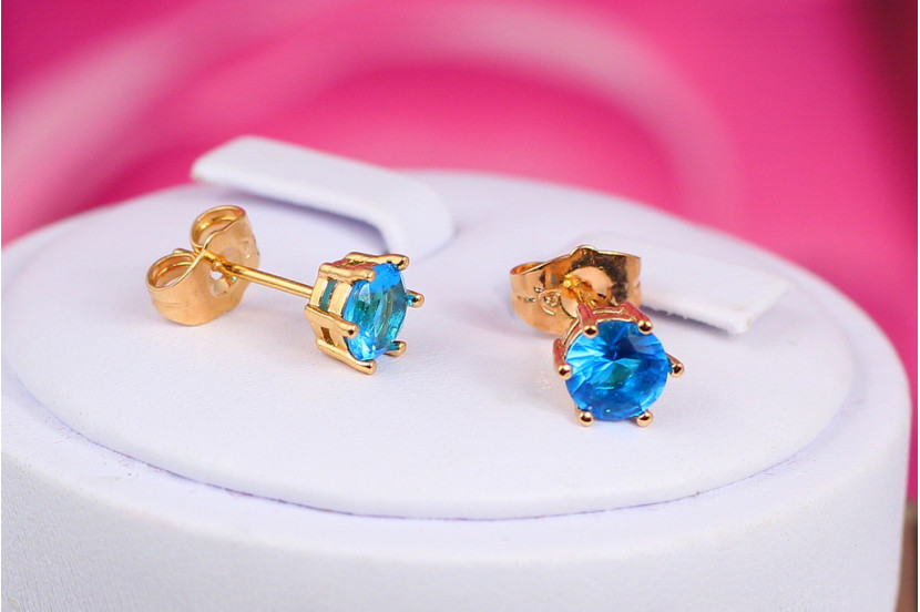 Сережки гвоздики Xuping Jewelry з блакитним каменем шість кріплень 6 мм золотисті