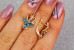Сережки Xuping Jewelry трехлистник з блакитними каменями 1.7 см золотисті