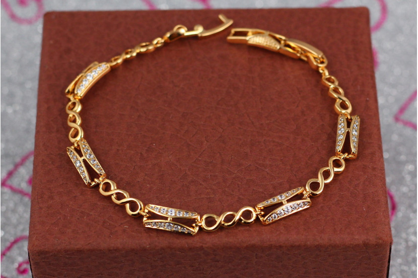 Браслет Xuping Jewelry прямокутні ланки з потрійними кільцями з білими каменями 17 см 5 мм золотистий