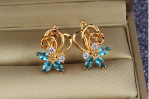Сережки Xuping Jewelry вихор з голубими камнями 1,8 см золотисті