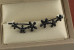 Сережки кафи Xuping Jewelry три квіточки 2 см з покриттям блек ган чорні