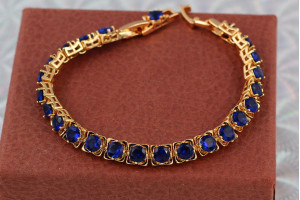 Браслет Xuping Jewelry із синіми каміннями по всій длині 17 см 6 мм золотистий
