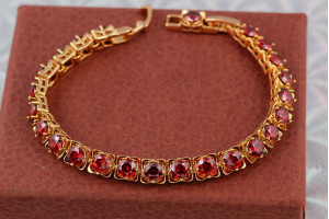 Браслет Xuping Jewelry з червоними камнями по всій довжині 17 см 6 мм золотистий