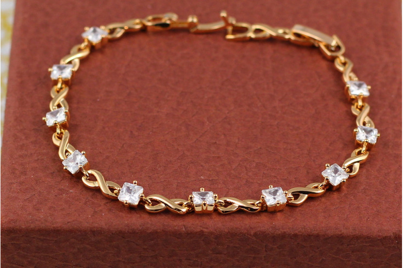 Браслет Xuping Jewelry вісімки з білими квадратними каменями по всій довжині 19 см 5 мм золотистий