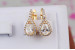 Сережки Xuping Jewelry маленька біла крапля в обідку з камінців 1.7 см золотисті