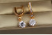 Сережки підвіски Xuping Jewelry з білим круглим каменем 3.1 см золотисті