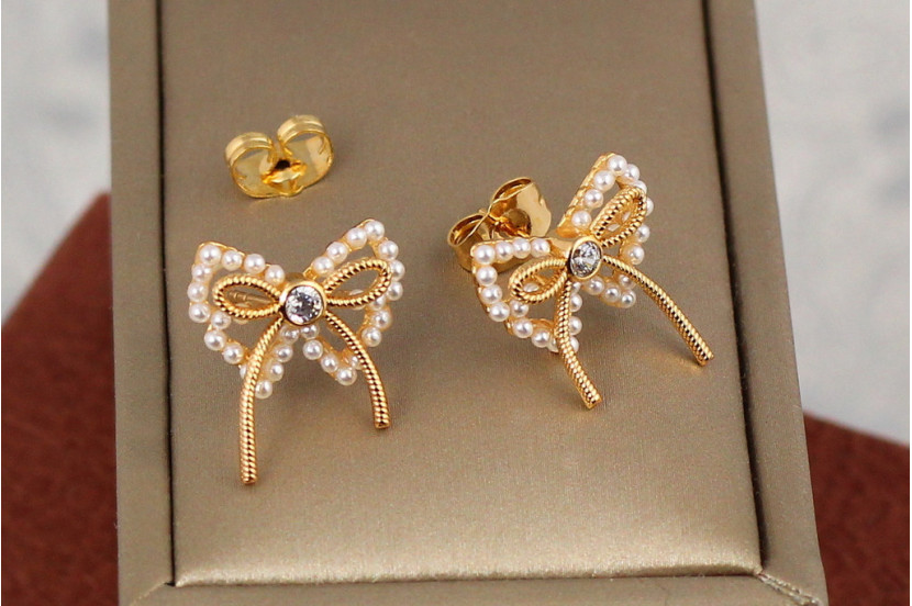 Сережки гвоздики Xuping Jewelry перлинні бантики 1.8 см золотисті