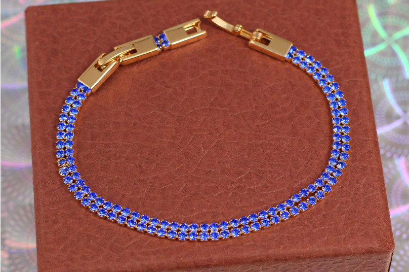 Браслет Xuping Jewelry дві доріжки із синіх фіанітів 19 см 4 мм золотистий