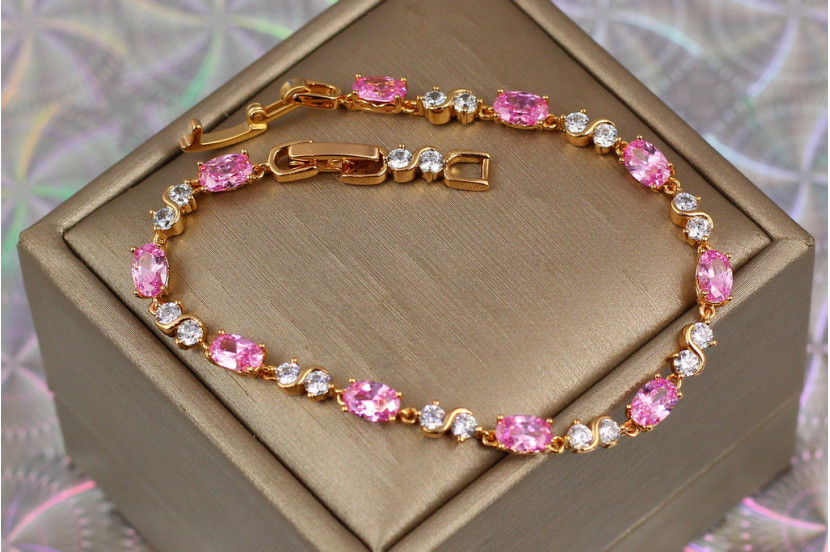 Браслет Xuping Jewelry хвиля з рожевими каменями 19 см 4 мм золотистий