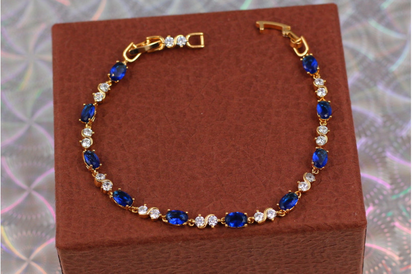 Браслет Xuping Jewelry хвиля із синіми каменями 19 см 4 мм золотистий