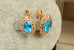 Сережки Xuping Jewelry маркиз із блакитним каменем 1.6 см золотисті