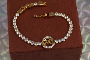 Браслет Xuping Jewelry нескінченність із білими фіанітами 19.5 см золотистий