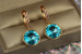 Сережки Xuping Jewelry підвіски великий камінь в обідку блакитні хамелеони 3 см золотисті