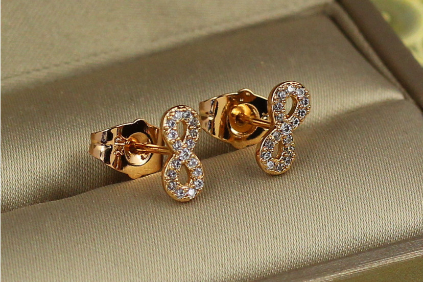 Сережки гвоздики Xuping Jewelry нескінченність із камінчиками 4 мм золотисті