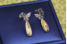 Сережки гвоздики Xuping Jewelry метелики з жовтою краплею Сваровські 2.5 см сріблясті
