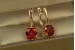 Сережки Xuping Jewelry велична простота з червоним каменем 2.3 см золотисті