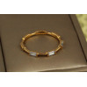 Кільце Xuping Jewelry Сальто з прямокутними каменями по колу р 19 золотисте