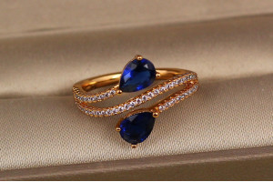 Кільце Xuping Jewelry зустрічні краплі із синіми каменями р 19 золотисте