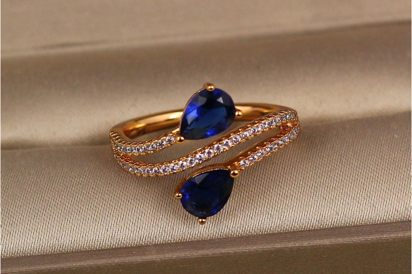 Кільце Xuping Jewelry зустрічні краплі із синіми каменями р 20 золотисте