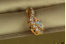 Кулон Xuping Jewelry круглий камінь світлий хамелеон у обідку з фіанітів 2.3 см золотистий