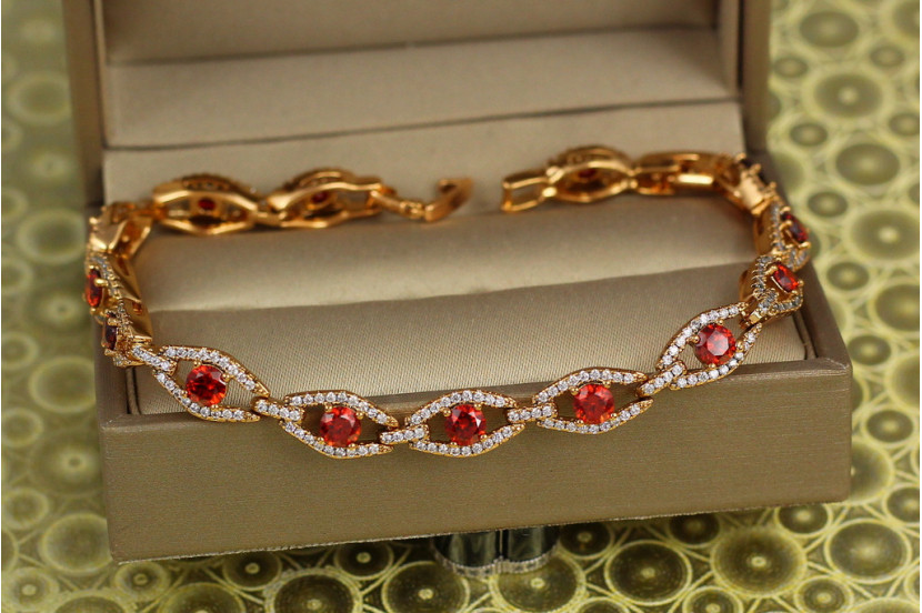 Браслет Xuping Jewelry Захоплення з червоним камінням 17 см 6 мм золотистий